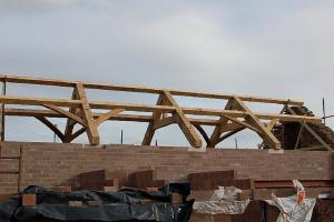 oak trusses on a concrete block structure